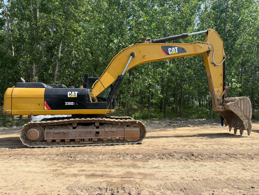 Used CAT 336D2L excavator full left side view in the machinery yard