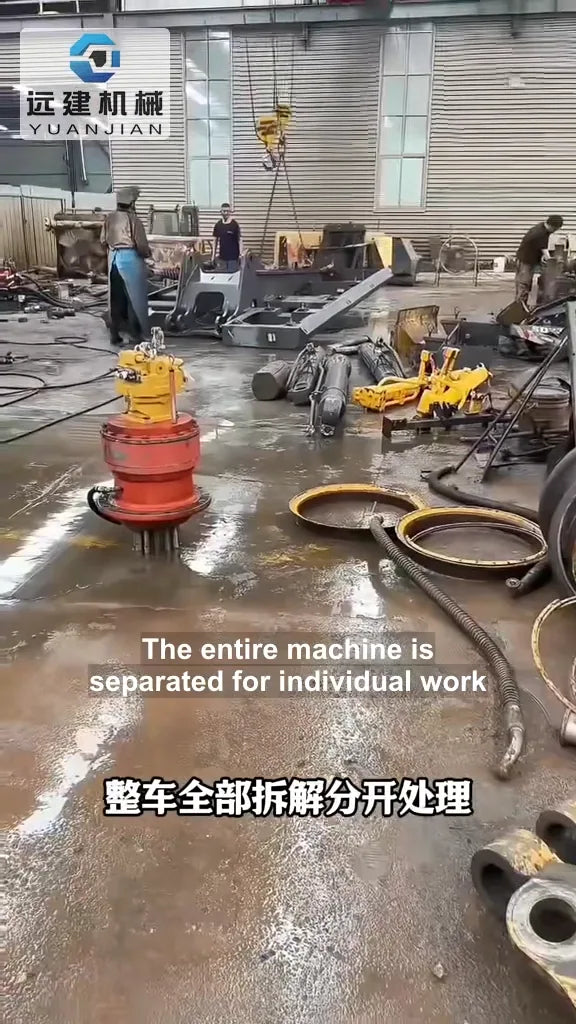 YUANJIAN refurbishment workshop with technicians and dismantled excavator components