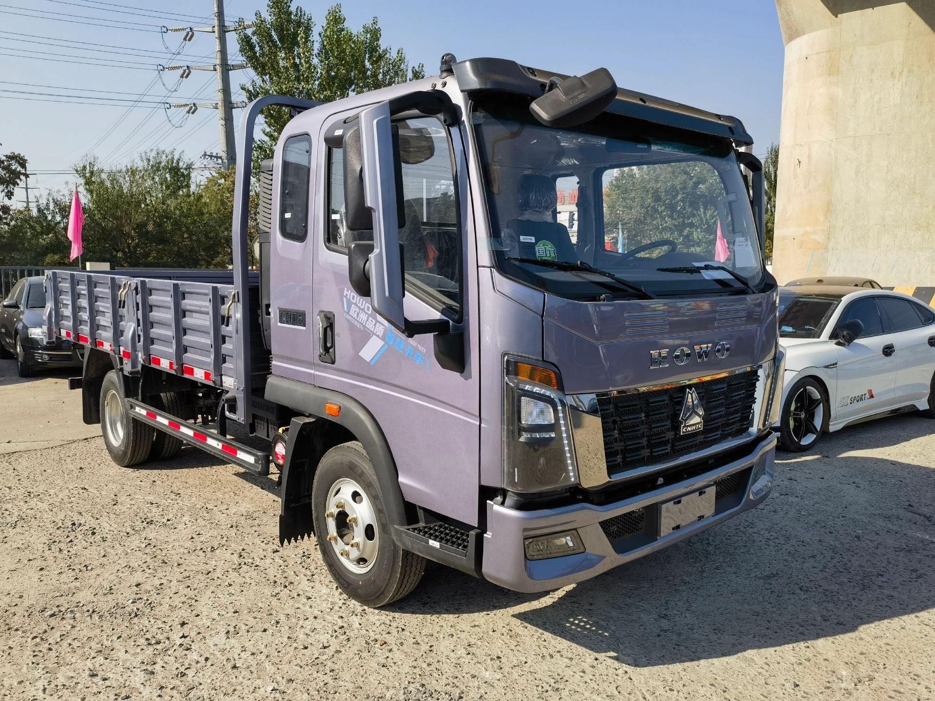 New Howo 160HP Flatbed Truck for Sale rear side view
