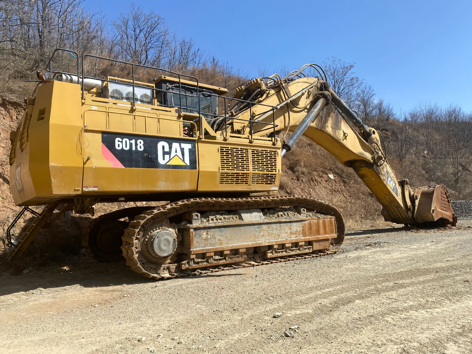 Used Caterpillar 6018 Backhoe Loader for Sale rear side view