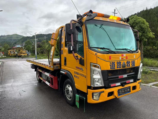 Used Howo LIGHT Flatbed Wrecker Truck for Sale rear side view