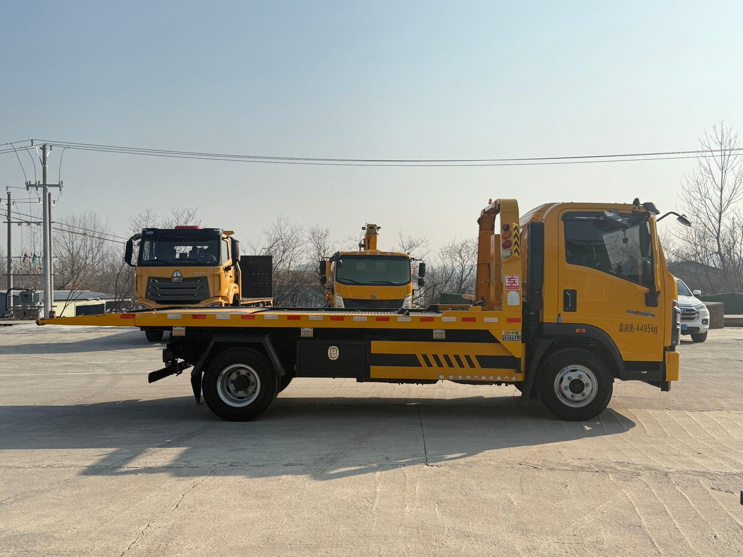 Used HOWO TONGSHUAI Heavy-duty Full Landing Wrecker
