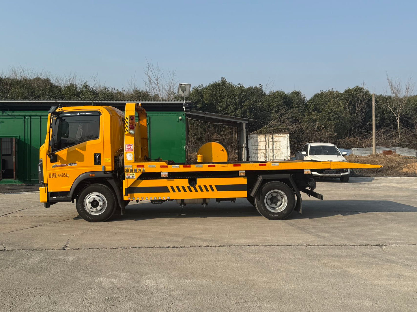 Used HOWO TONGSHUAI Heavy-duty Full Landing Wrecker