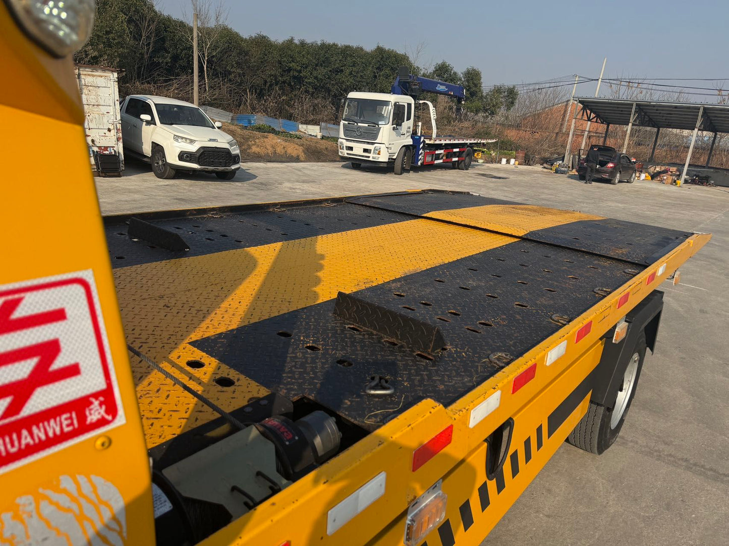 Used HOWO TONGSHUAI Heavy-duty Full Landing Wrecker