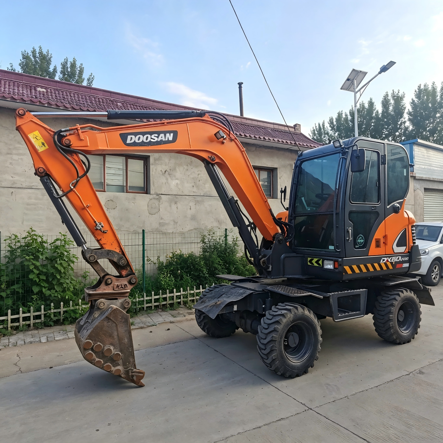 Used Doosan DX60W Excavator for Sale side view
