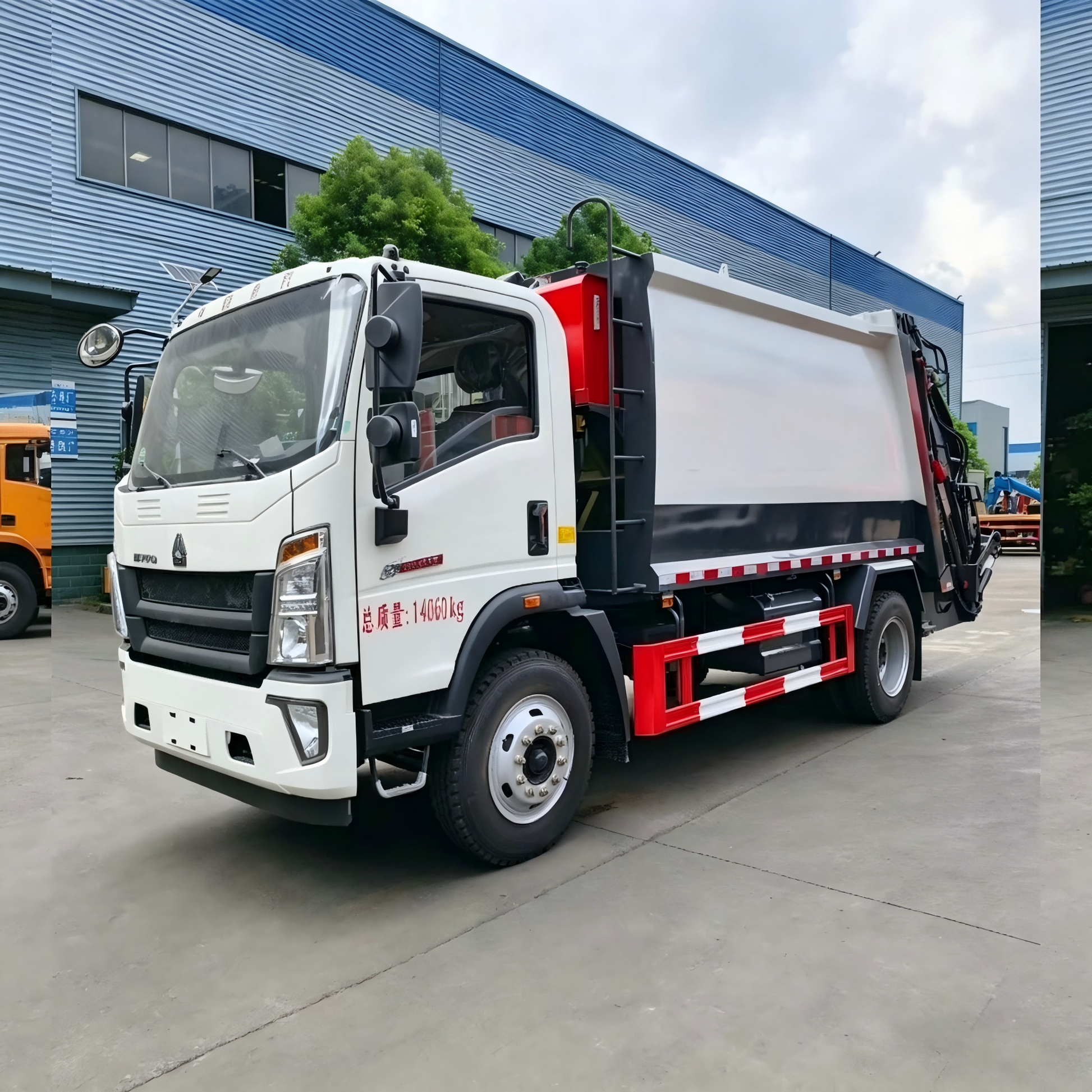 Used Sinotruk HOWO 12M³ Compressed Garbage Truck for Sale side view
