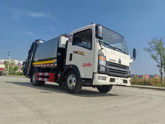 Used Sinotruk HOWO 6M³ Compressed Garbage Truck for Sale rear side view