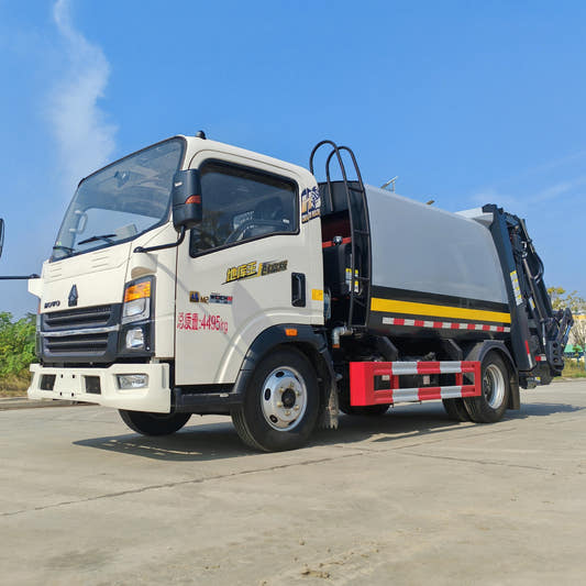 Used Sinotruk HOWO 6M³ Compressed Garbage Truck for Sale side view