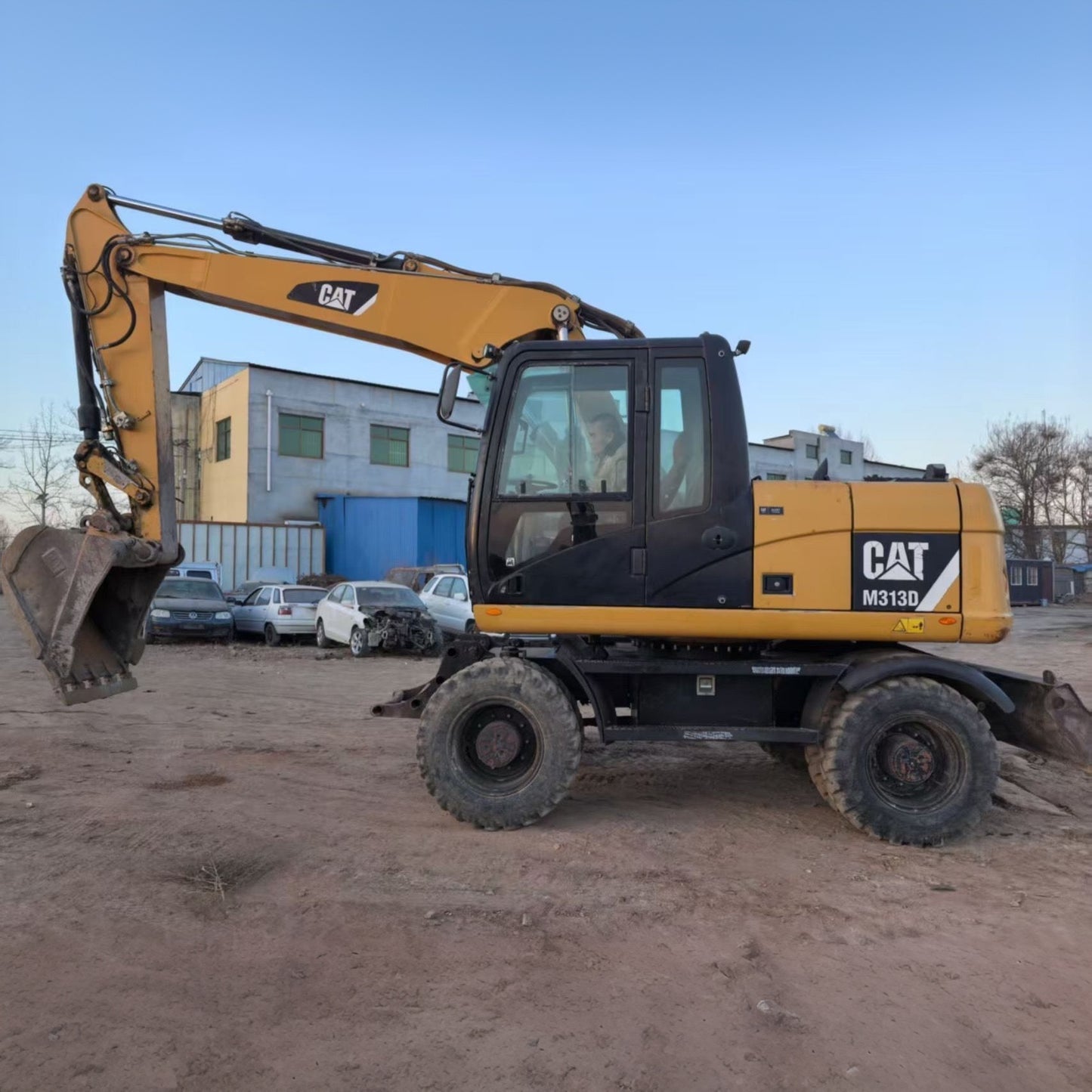 Used CAT M313D wheel excavator real inventory view 1