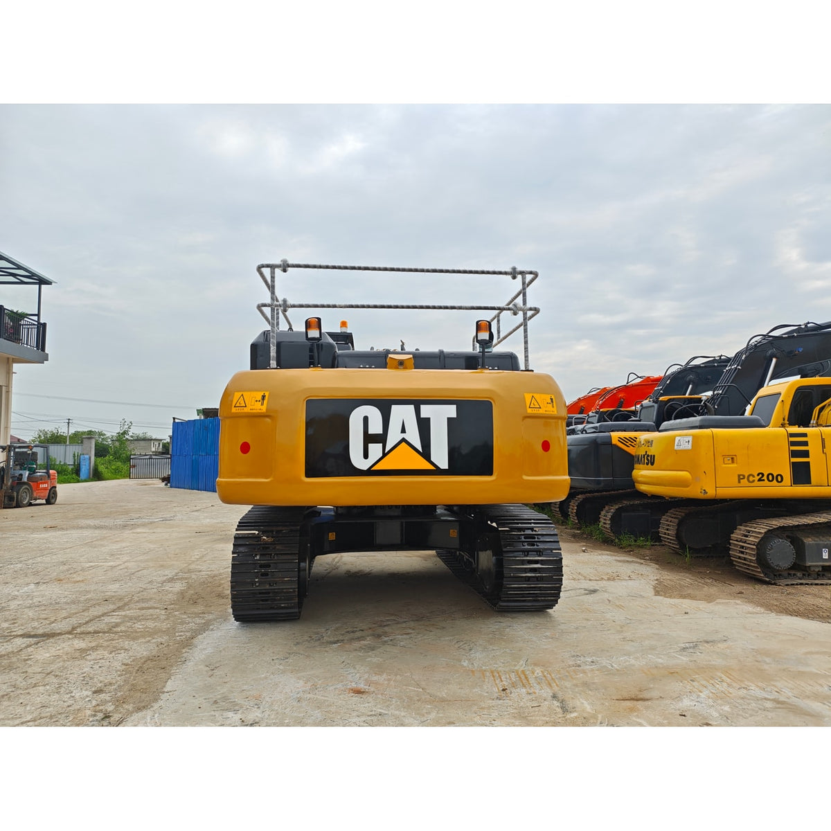 Used CAT 336D2 excavator - rear view and crawler tracks